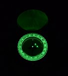 Luminescent Wilderness Scouting Compass with Rotated Bezel in the Dark